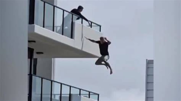 What happens to a body falling from a building